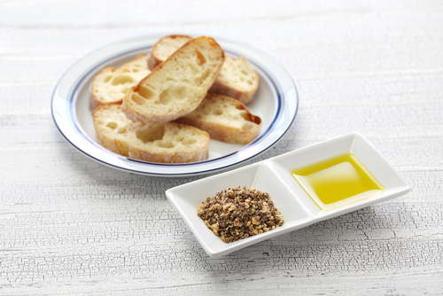 Bread with Dukkah nut mixture and olive oil