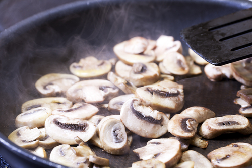 Mushrooms, sauteeing in a pan