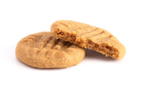 peanut butter cookies stacked on white background